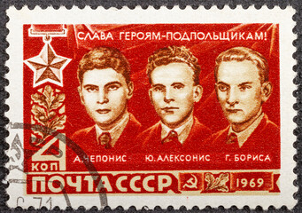 USSR- CIRCA 1969: a stamp printed by USSR, shows A. Cheponis, J. Alecsonis, G. Borisa. Heroes of the Soviet Union, circa1969.