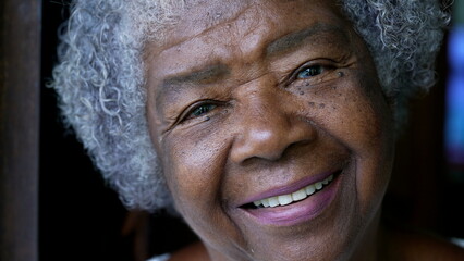 A happy senior black woman portrait face a smiling African 80s lady
