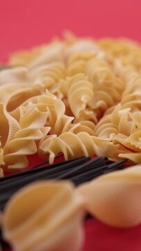 Vertical video: Pasta and spaghetti in a plate