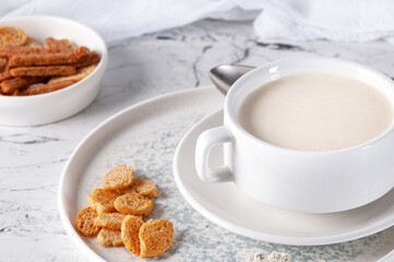 Mushroom puree soup served with croutons. Tasty soup.