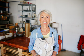Shes found the secret to small business success. Shot of a senior woman running a small business.