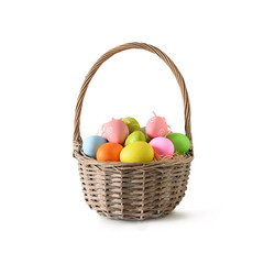 Easter wicker basket with pastel colorful eggs decorated isolated on white background. Festive...