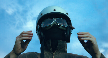 motorcyclist rides through a beautiful field