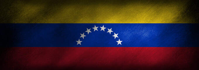 The flag of Venezuela on a grunge background