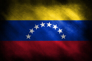 The flag of Venezuela on a grunge background