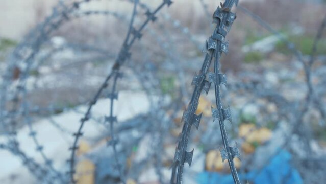 Moria Refugee camp razor wire close up rack-focus Shot