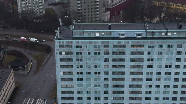 Drone flying over popular social housing at Solna city, Sweden. Aerial top-down forward
