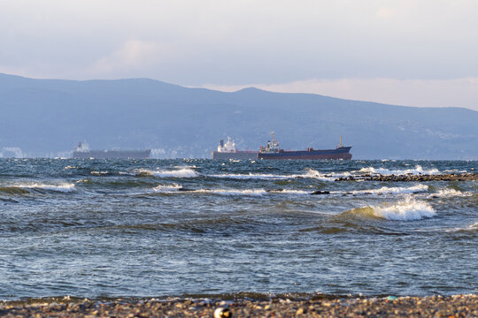 Ships carrying cargo to Aliaga / Izmir Bay are in the stormy sea