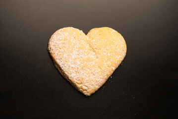 Shortbread in the shape of a heart isolated on white background.