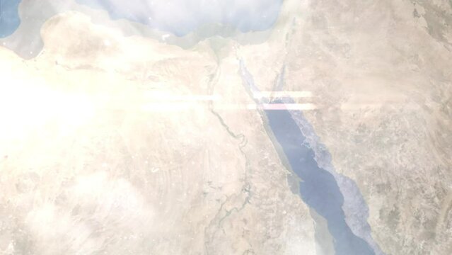 Earth zoom in from outer space to city. Zooming on Sohag, Egypt. The animation continues by zoom out through clouds and atmosphere into space. Images from NASA