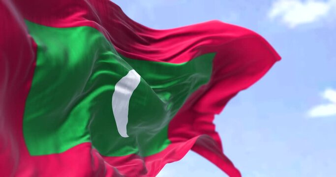 Detail of the national flag of Maldives waving in the wind on a clear day