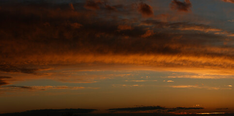 panoramic cloudscape yellow sunset