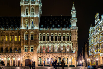 Fototapeta na wymiar Brussels Town Hall in Grand Place at night. Grand Place is the central square of Brussels capital city, surrounded by opulent guildhalls.