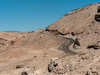 Stunning desert roads in the famous Valle de la Luna (Valley of the Moon), San Pedro de Atacama, Chile. 
