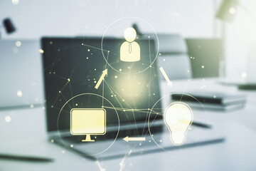 Double exposure of social network icons concept with modern laptop on background. Marketing and promotion concept