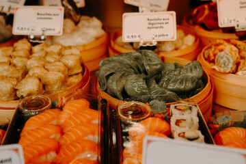 Street food. Ravioli, dumplings, sushi, thai food restaurant in paris, asian dumplings.