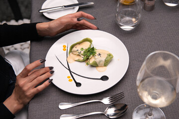 Ravioli in cream, Homemade spinach and ricotta ravioli with sage butter sauce, parmesan and pepper