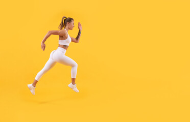Fototapeta na wymiar sport girl runner running with copy space on yellow background