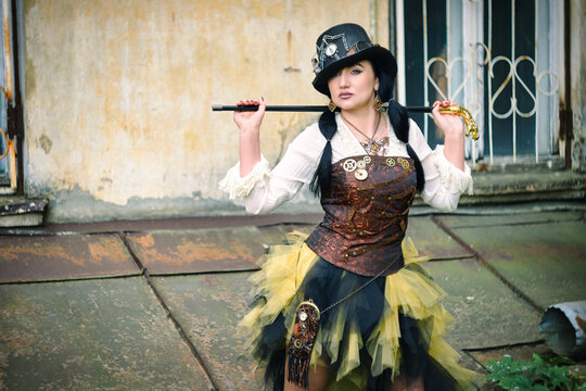 retro portrait of a woman with a cane steampunk style.