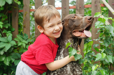 child and dog. People with animals. Positive emotions. Happy moments. Love