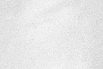 Seamless texture of white cement wall a rough surface, with space for text, for a background.