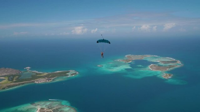Skydiver over the ocean at beautiful island in the Caribbean