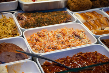 Assortment of gourmet meat dishes in butchery delicatessen shop