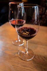 Glass of dry French merlot red wine from Bordeaux, France