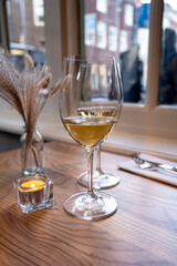 Two glasses of cold dry French sauvignon blanc white wine served in French restaurant