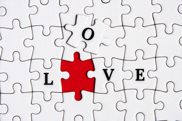 To view of text on missing jigsaw puzzle - Love. Love and romance concept
