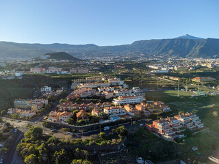 Aerial view on colorful houses and top of mount Teide in Puerto de la Cruz, Tenerife, Canary islands at sunrise