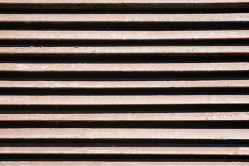 Metal stripes pattern. Ventilation grille texture. Industrial iron metal bars. Grunge grid lines. Gray metal frame background.
