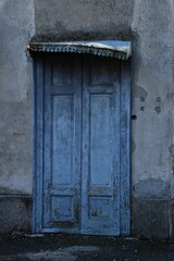 Italy, Lombardy: Old doorway of the abandoned house.