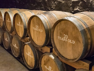 Wooden barrels used for port wine aging in Vila Nova de Gaia, Portugal