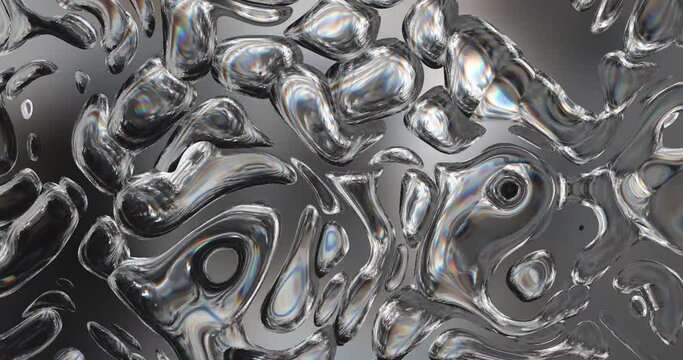 Abstract animation with silver drops moving randomly. Computer generated metaballs looks like gallium.