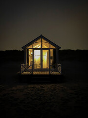Beach hut at night