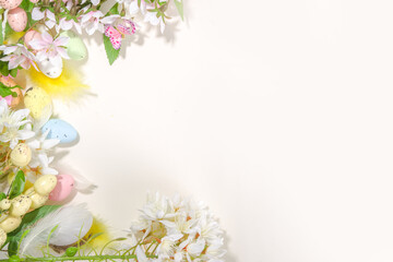 Fototapeta na wymiar Easter holiday background with flowers and eggs