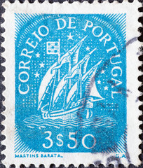 Portugal - circa 1943: a postage stamp from Portugal, showing a historical Caravel with sails from...