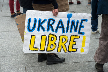 Strasbourg - France - 12 March 2022 - People protesting against the war with ukrainian flags with textin french : Ukkraine libre, in english : free Ukraine