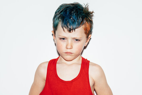 Offended boy with dyed hair