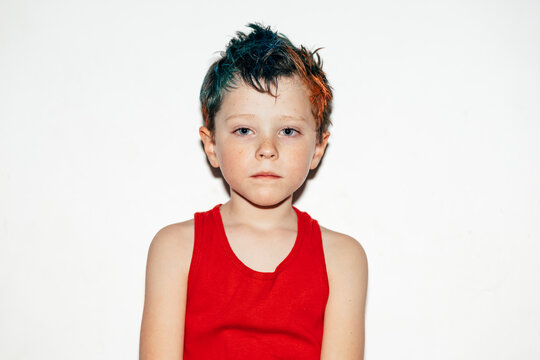 Offended boy with dyed hair