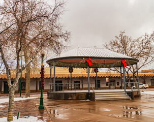 Fototapeta premium Santa Fe bandstand decorated for Christmas holidays on a cold winter morning in the historic Plaza of Santa Fe, New Mexico 