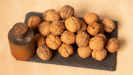A lot of walnuts on the table as background