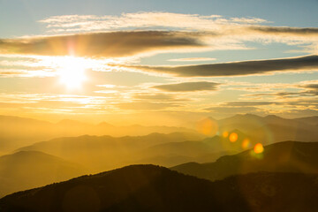 Sunset and wind clouds in La Garrotxa, Girona, Spain