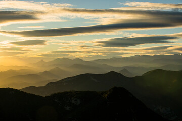 Sunset and wind clouds in La Garrotxa, Girona, Spain