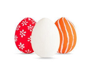 Hand painted red, orange and white Easter eggs decorated white lines and dots isolated on white. Colored easter eggs on white background