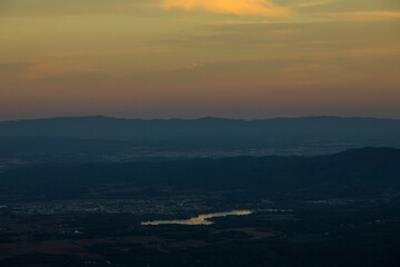 Sunset and wind clouds in La Garrotxa, Girona, Spain