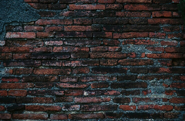 weathered brick walls texture. Part of the old temple wall in Thailand.	