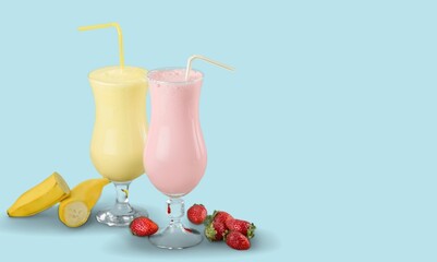 Protein rich smoothies with yogurt and frozen strawberries in glass. Bright berry