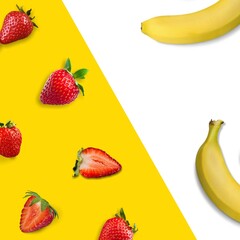 Creative layout made of strawberry and bananas on the background. Food concept.
